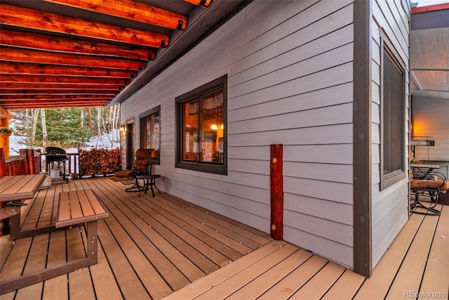 2150 Michigan Hill Rd, Jefferson, CO 80456 - wooden deck with area for grilling and outdoor dining space