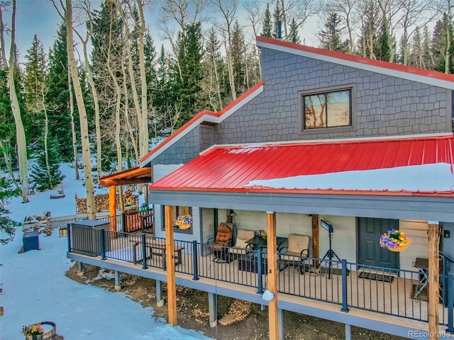 2150 Michigan Hill Rd, Jefferson, CO 80456 - view of front facade with a deck
