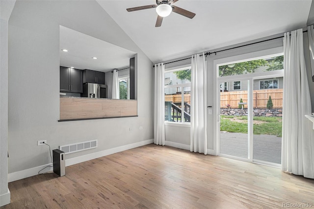 19334 E Prentice Pl, Centennial, CO 80015 - unfurnished living room featuring a ceiling fan, vaulted ceiling, light wood-style floors, and recessed lighting