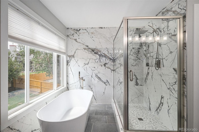 19334 E Prentice Pl, Centennial, CO 80015 - full bath featuring a soaking tub, a marble finish shower, and tile walls