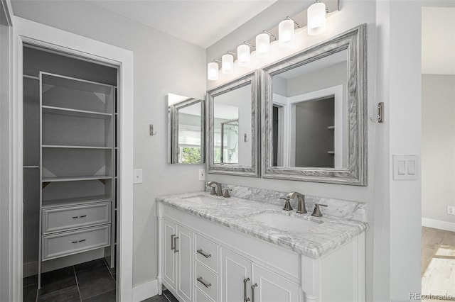 19334 E Prentice Pl, Centennial, CO 80015 - bathroom with double vanity and a closet