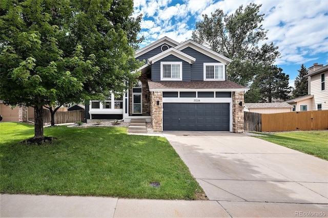 19334 E Prentice Pl, Centennial, CO 80015 - view of front of property with concrete driveway, a garage, and stone siding
