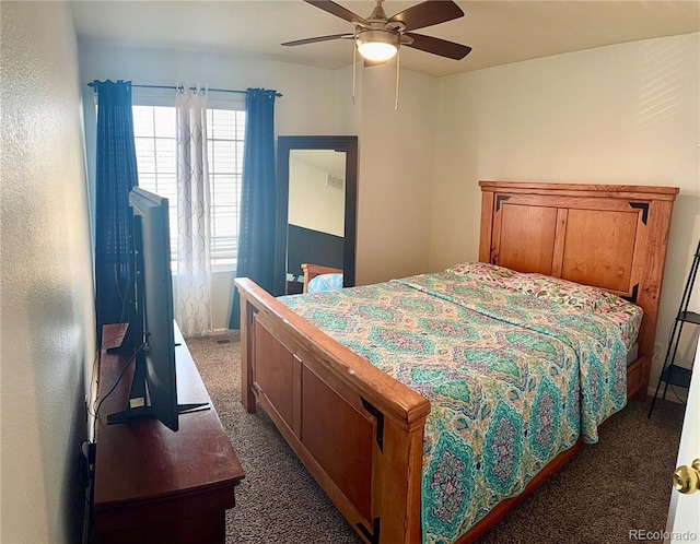 bedroom featuring a ceiling fan and carpet flooring