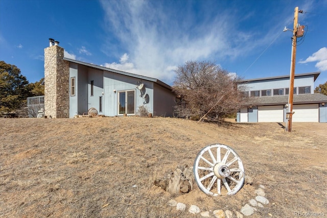 view of front of home with a chimney