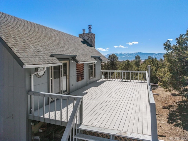 wooden terrace with a mountain view