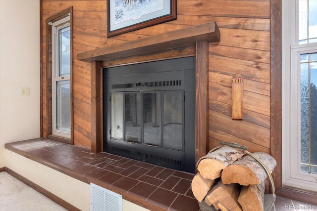 interior details with wooden walls and visible vents