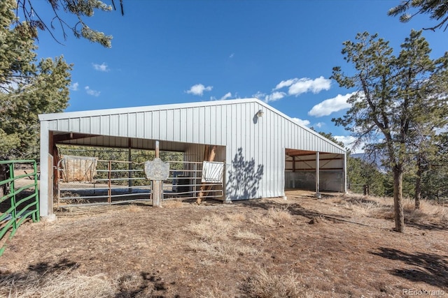 view of outbuilding featuring an exterior structure and an outdoor structure