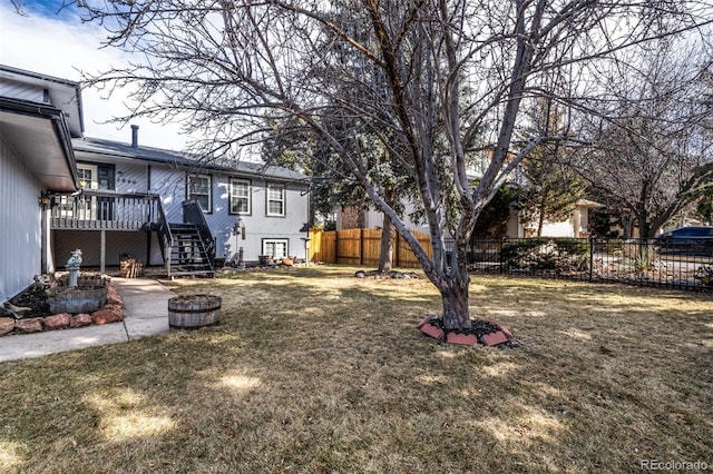 view of yard with a deck