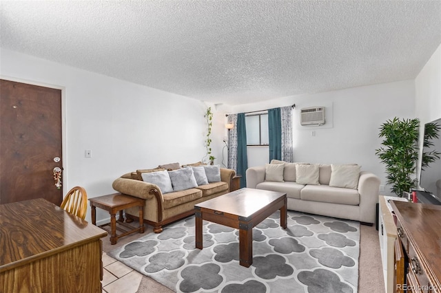 living room featuring a textured ceiling and a wall mounted air conditioner