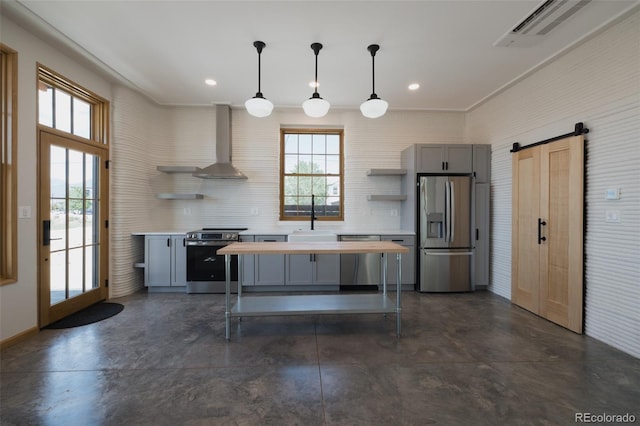 740 E Pine St, Buena Vista, CO 81211 - kitchen featuring appliances with stainless steel finishes, open shelves, butcher block countertops, gray cabinetry, and wall chimney range hood