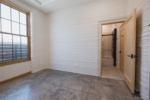 740 E Pine St, Buena Vista, CO 81211 - spare room featuring concrete floors