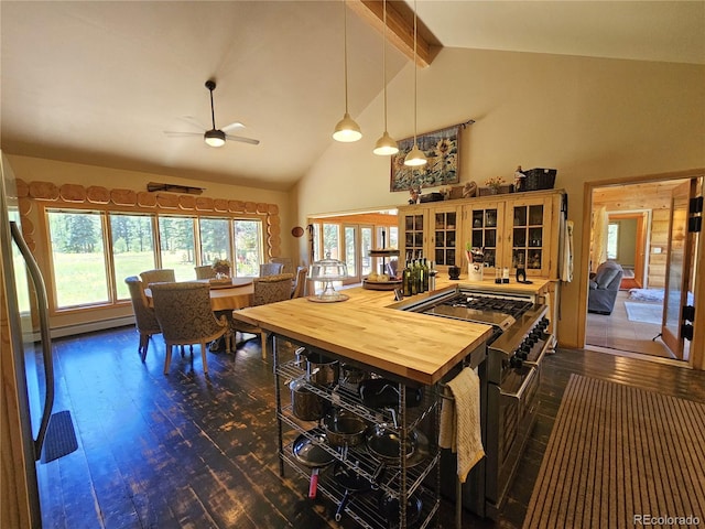 dining room featuring ceiling fan, beam ceiling, dark hardwood / wood-style flooring, and high vaulted ceiling