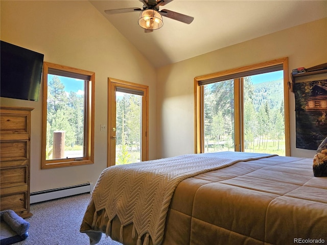 bedroom featuring ceiling fan, a baseboard radiator, vaulted ceiling, and multiple windows