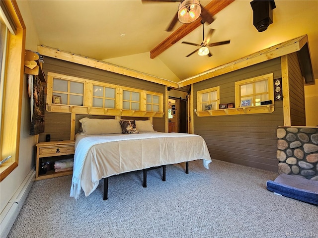 bedroom featuring baseboard heating, carpet, ceiling fan, and wood walls