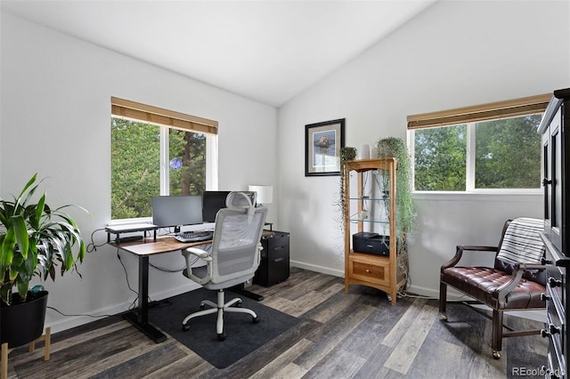 office featuring lofted ceiling and dark hardwood / wood-style flooring