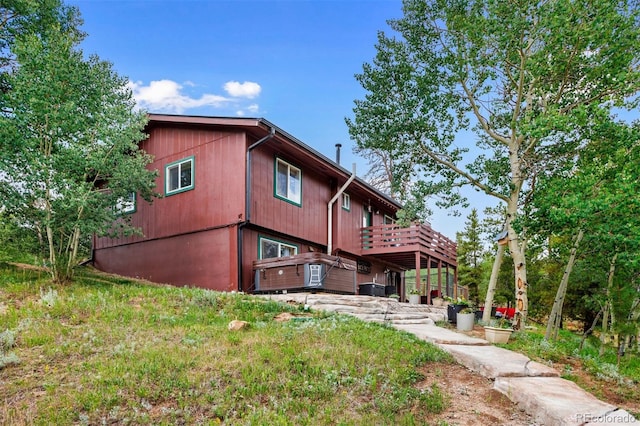 rear view of house with a deck