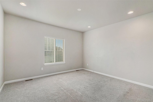 view of carpeted spare room