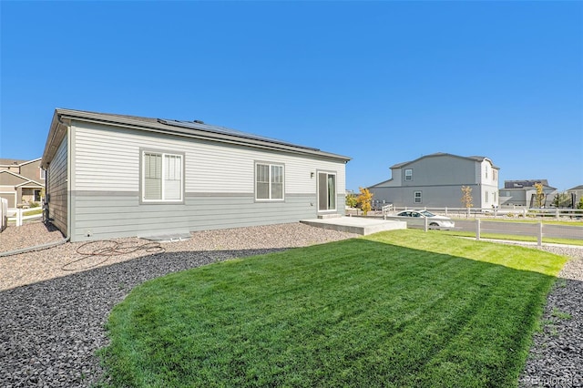 exterior space with a patio and a yard