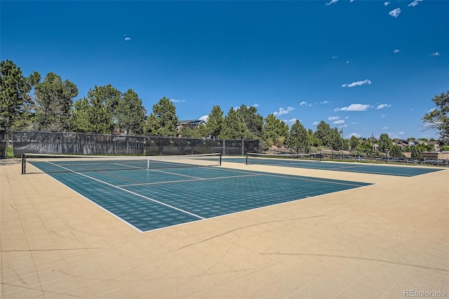 view of sport court with fence and community basketball court