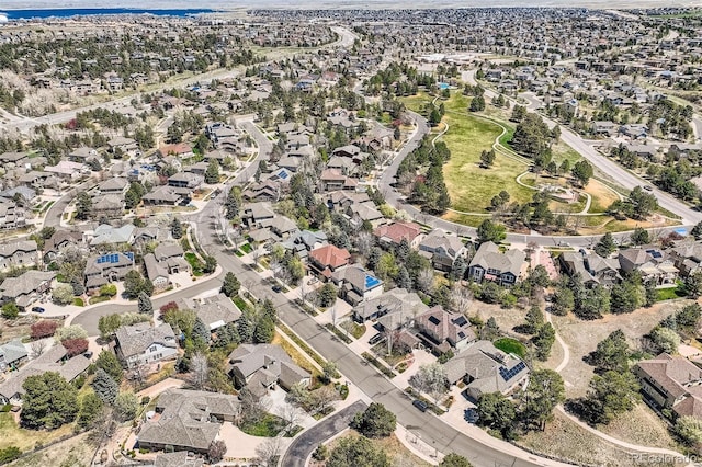 birds eye view of property with a residential view