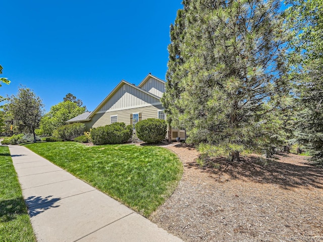 24487 E Frost Dr, Aurora, CO 80016 - view of property exterior with a yard