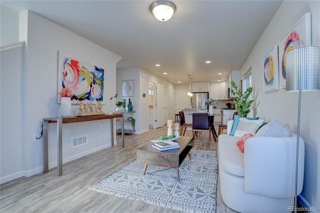 living room featuring light wood-type flooring