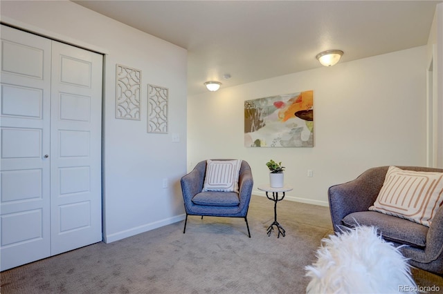 sitting room with light colored carpet