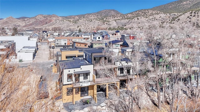 bird's eye view featuring a mountain view and a residential view