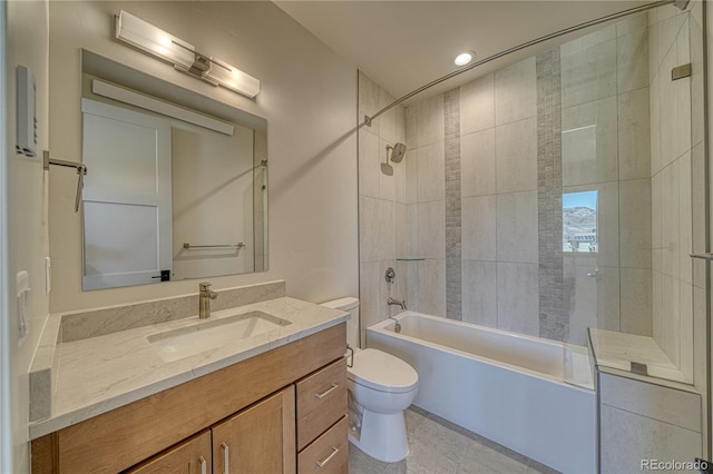 bathroom featuring vanity, toilet, recessed lighting, and shower / bathtub combination