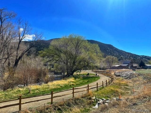 mountain view featuring a rural view