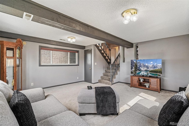 living room featuring baseboards, beamed ceiling, stairs, carpet flooring, and a textured ceiling