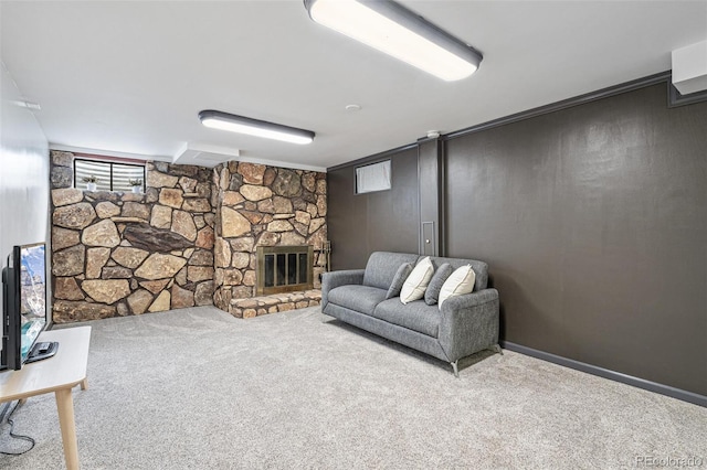 living room with carpet floors and a stone fireplace