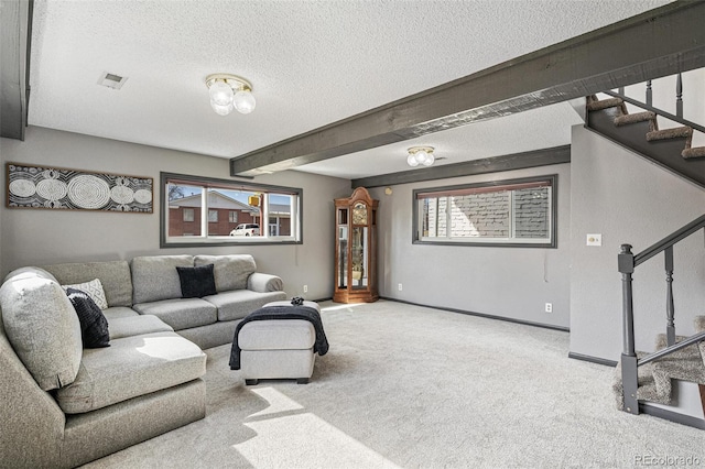 6190 Garrison St, Arvada, CO 80004 - carpeted living area with stairway, a textured ceiling, baseboards, and beam ceiling