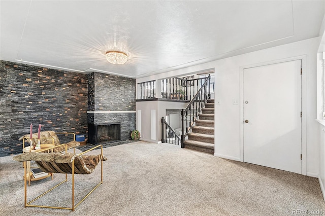 6190 Garrison St, Arvada, CO 80004 - carpeted living room featuring a large fireplace and stairway