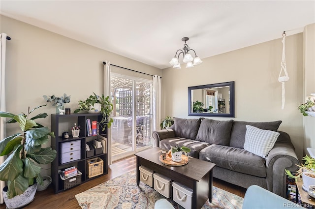 1974 E 102nd Cir, Thornton, CO 80229 - living room featuring wood finished floors and a chandelier