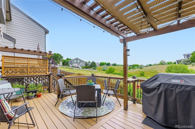 1974 E 102nd Cir, Thornton, CO 80229 - deck with a grill and a pergola