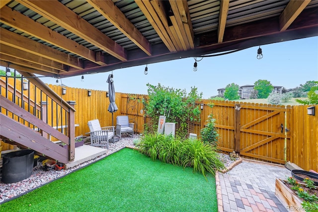 1974 E 102nd Cir, Thornton, CO 80229 - fenced backyard with a gate and a patio