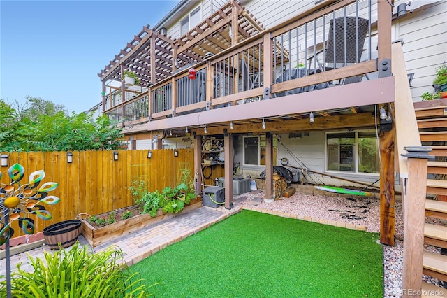 1974 E 102nd Cir, Thornton, CO 80229 - back of house featuring a wooden deck