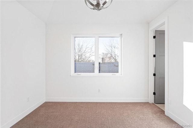 unfurnished room featuring carpet flooring