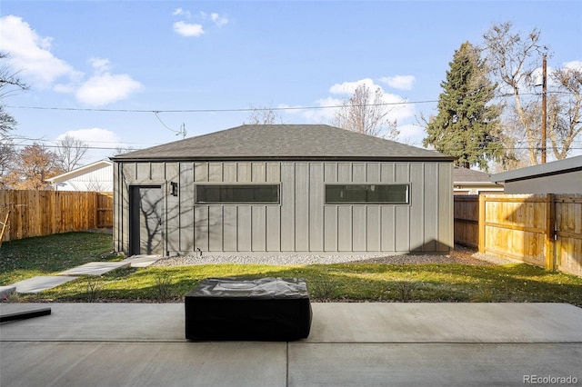 view of outdoor structure featuring a yard