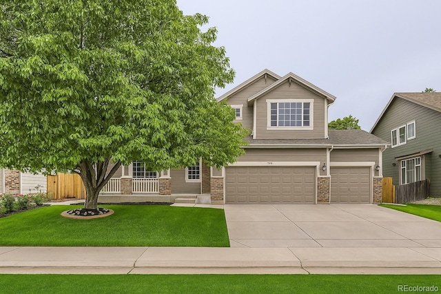 334 Octillo St, Brighton, CO 80601 - view of front of home featuring brick siding, concrete driveway, and a garage
