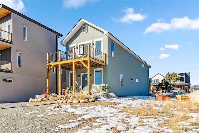 485 E Arkansas St, Buena Vista, CO 81211 - snow covered rear of property featuring stucco siding