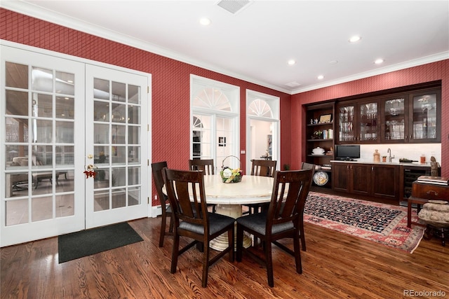 4 Cherry Hills Farm Dr, Cherry Hills Village, CO 80113 - dining area with french doors, wine cooler, ornamental molding, dark wood-type flooring, and recessed lighting