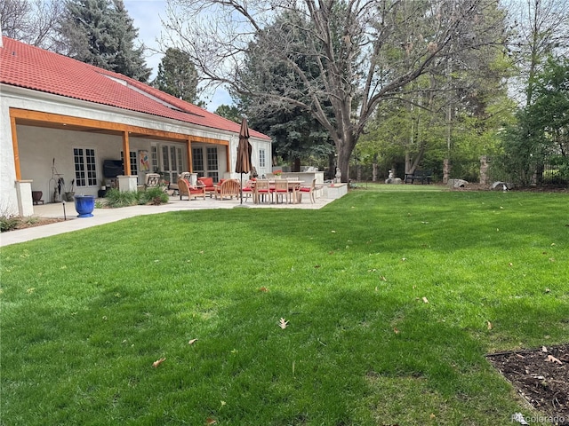 4 Cherry Hills Farm Dr, Cherry Hills Village, CO 80113 - view of grassy yard with a patio