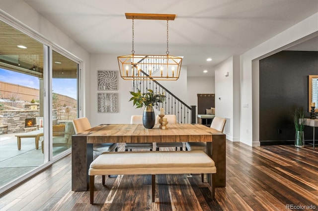 dining area featuring dark hardwood / wood-style floors