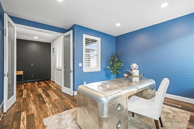 dining space featuring french doors and dark hardwood / wood-style floors