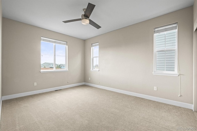 7875 S Grand Baker St, Aurora, CO 80016 - empty room featuring a ceiling fan and light colored carpet