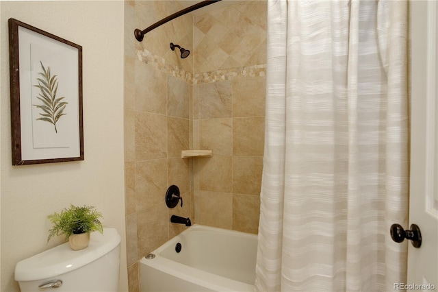 bathroom with shower / bath combination with curtain and toilet