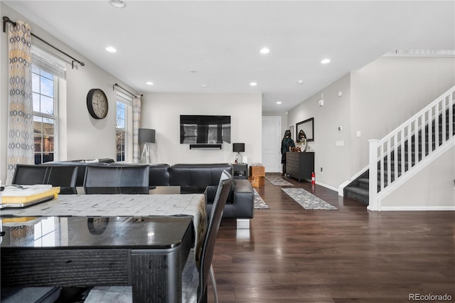 dining area featuring dark hardwood / wood-style flooring