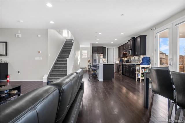 living room featuring dark hardwood / wood-style flooring